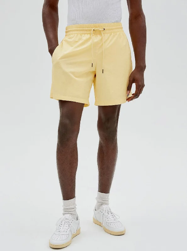 athletic fit pants for men -GUESS Originals Butter Yellow Nylon Patch Shorts